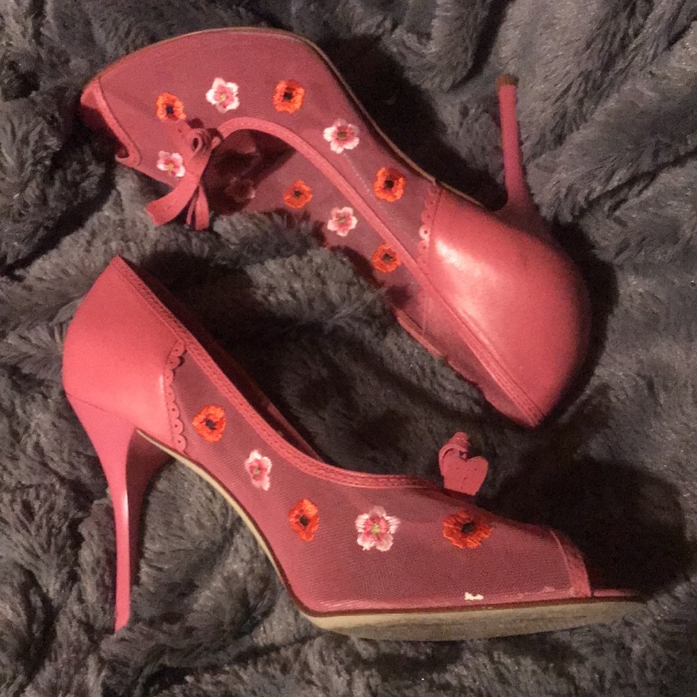 BCBGirls embroidered peep tie heels.